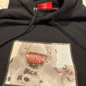 Supreme Black Hoodie with Astronaut Print—rare